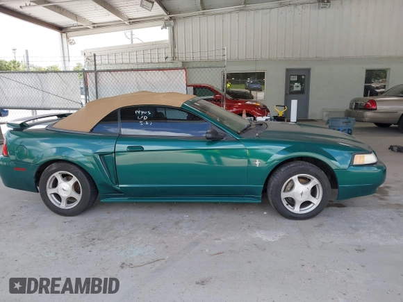 2001 Ford Mustang Deluxe z VIN 1FAFP44441F198354, wystawiony jako IAAI lot #42433701 z przebiegiem 69 328 mil mil oraz . Historia ofert i sprzedaży dostępna na DreamBid. Obrazek 13.