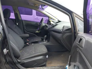 2012 Ford Fiesta SE z VIN 3FADP4BJ8CM173590, wystawiony jako IAAI lot #40732721 z przebiegiem 156 874 mil mil oraz . Historia ofert i sprzedaży dostępna na DreamBid. Obrazek 5.