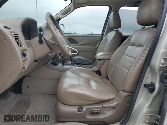 2005 Ford Escape Limited z VIN 1FMYU04195KB37679, wystawiony jako Copart lot #50656585 z przebiegiem 218 891 mil mil oraz Szkoda całkowita • Salvage title. Historia ofert i sprzedaży dostępna na DreamBid. Obrazek 7.
