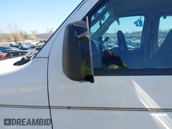2008 Ford Econoline Passenger XL with VIN 1FBNE31L98DA84670, listed as a IAAI auction lot 42042417 with 216,868 mi miles. Bid and sale history available at carsss.com. Image 14.