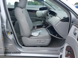 2010 Toyota Avalon XL with VIN 4T1BK3DB6AU369581, listed as a IAAI auction lot 42159063 with 137,996 mi miles and . Bid and sale history available at carsss.com. Image 5.