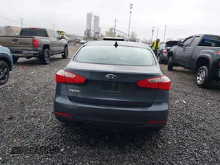 2016 Kia Forte LX with VIN KNAFK4A69G5560835, listed as a IAAI auction lot 42003212 with 100,873 mi miles. Bid and sale history available at carsss.com. Image 16.