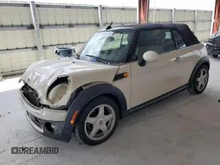 2010 MINI Convertible with VIN WMWMR3C59ATU98597, listed as a Copart auction lot 53336025 with 88,273 mi miles and Salvage Title. Bid and sale history available at DreamBid. Image 1.