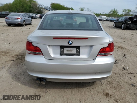 2009 BMW 1 Series 128i with VIN WBAUP73579VK74936, listed as a Copart auction lot 54558905 with 128,563 mi miles and Clean Title. Bid and sale history available at carsss.com. Image 6.