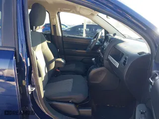 2014 Jeep Compass Sport with VIN 1C4NJCBA2ED594035, listed as a IAAI auction lot 41282961 with 118,606 mi miles. Bid and sale history available at carsss.com. Image 5.