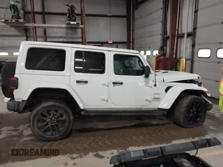 2021 Jeep Wrangler Unlimited Sahara with VIN 1C4JJXP60MW830307, listed as a IAAI auction lot 41869863 with 37,201 mi miles and . Bid and sale history available at DreamBid. Image 13.