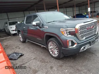 2019 GMC Sierra 1500 Denali z VIN 1GTU9FEL3KZ340061, wystawiony jako IAAI lot #41951756 z przebiegiem 87 028 mil mil oraz . Historia ofert i sprzedaży dostępna na DreamBid. Obrazek 1.