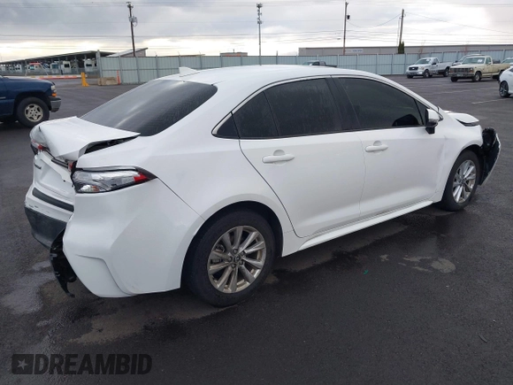 2023 Toyota Corolla Hybrid LE with VIN JTDBCMFE8PJ010659, listed as a IAAI auction lot 41772192 with 33,644 mi miles. Bid and sale history available at carsss.com. Image 4.
