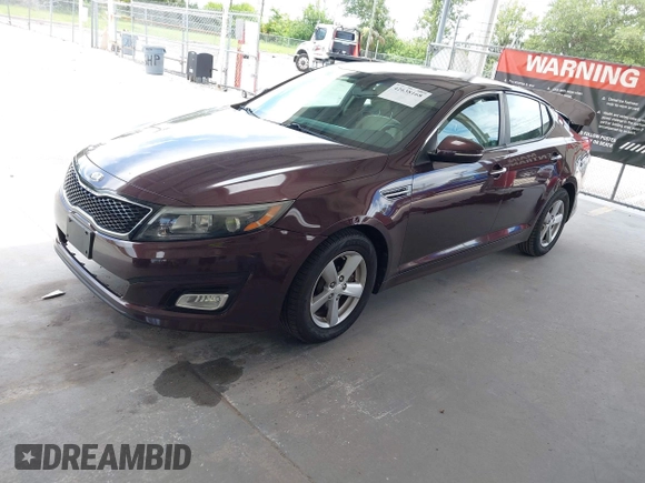2015 Kia Optima LX with VIN 5XXGM4A72FG429346, listed as a IAAI auction lot 42638168 with 153,069 mi miles and . Bid and sale history available at DreamBid. Image 2.