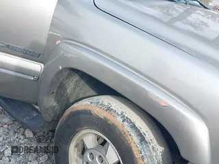 2002 Chevrolet Tahoe LS z VIN 1GNEC13Z22R197594, wystawiony jako IAAI lot #41475477 z przebiegiem 384 968 mil mil oraz . Historia ofert i sprzedaży dostępna na DreamBid. Obrazek 12.