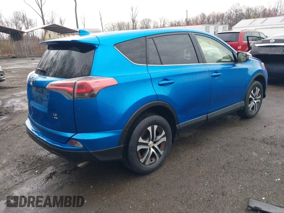 2016 Toyota RAV4 LE with VIN JTMBFREV9GJ100635, listed as a IAAI auction lot 41858669 with 171,644 mi miles. Bid and sale history available at carsss.com. Image 4.