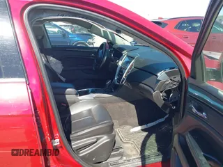 2014 Cadillac SRX with VIN 3GYFNAE36ES597007, listed as a IAAI auction lot 41675527 with 105,613 mi miles and . Bid and sale history available at DreamBid. Image 5.