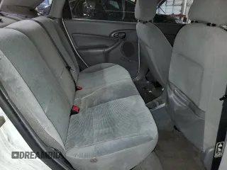 2002 Ford Focus LX with VIN 1FAFP33P52W126344, listed as a Copart auction lot 49757324 with 140,612 mi miles and Salvage Title. Bid and sale history available at DreamBid. Image 11.