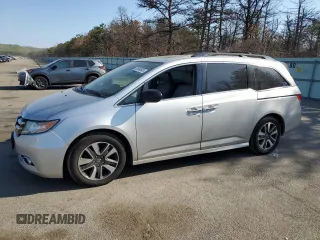 2014 Honda Odyssey Touring with VIN 5FNRL5H94EB094357, listed as a Copart auction lot 53930635 with 210,448 mi miles and Salvage Title. Bid and sale history available at carsss.com. Image 1.