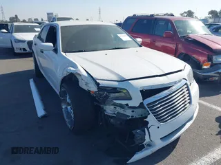 2014 Chrysler 300 S with VIN 2C3CCABG0EH235784, listed as a IAAI auction lot 41345692 with 109,920 mi miles and . Bid and sale history available at DreamBid. Image 1.