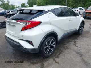 2019 Toyota C-HR XLE z VIN NMTKHMBX9KR095031, wystawiony jako IAAI lot #42191087 z przebiegiem 102 167 mil mil oraz . Historia ofert i sprzedaży dostępna na DreamBid. Obrazek 4.