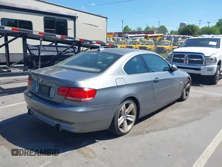 2007 BMW 3 Series 335i with VIN WBAWB73507P032904, listed as a IAAI auction lot 42034548 with 224,660 mi miles and . Bid and sale history available at DreamBid. Image 4.