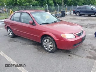 2002 Mazda Protege DX z VIN JM1BJ225821586258, wystawiony jako IAAI lot #42366064 z przebiegiem 167 332 mil mil oraz . Historia ofert i sprzedaży dostępna na DreamBid. Obrazek 1.