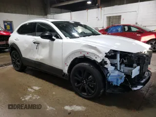 2023 Mazda CX-30 Premium Plus with VIN 3MVDMBEY3PM587798, listed as a Copart auction lot 86524444 with 9,860 mi miles and Salvage title. Bid and sale history available at DreamBid. Image 4.