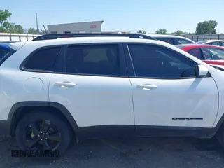 2019 Jeep Cherokee Latitude Plus with VIN 1C4PJLLB0KD339282, listed as a IAAI auction lot 42231050 with 115,901 mi miles and . Bid and sale history available at DreamBid. Image 13.