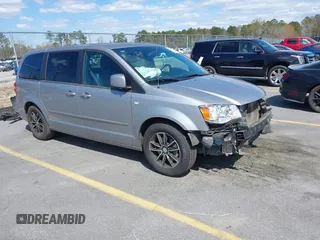 2014 Dodge Grand Caravan SXT with VIN 2C4RDGCGXER261467, listed as a IAAI auction lot 41801810 with 97,322 mi miles and . Bid and sale history available at DreamBid. Image 1.