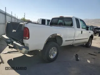 1999 Ford F-250 XL with VIN 1FTNX21S2XEC45408, listed as a Copart auction lot 74401994 with 159,716 mi miles and Clean title. Bid and sale history available at DreamBid. Image 3.