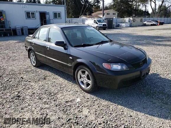 2003 Mazda Protege DX with VIN JM1BJ226231214537, listed as a Copart auction lot 54448615 with 147,753 mi miles and Salvage Title. Bid and sale history available at DreamBid. Image 13.