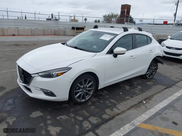 2018 Mazda Mazda3 5-Door Grand Touring with VIN 3MZBN1M33JM169834, listed as a IAAI auction lot 41867369 with 94,198 mi miles. Bid and sale history available at carsss.com. Image 18.