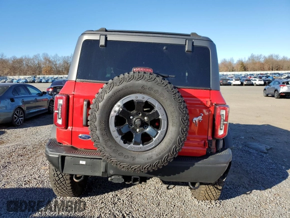 2021 Ford Bronco z VIN 1FMDE5CH3MLA60288, wystawiony jako Copart lot #79826644 z przebiegiem 12 451 mil mil oraz Szkoda całkowita • Salvage title. Historia ofert i sprzedaży dostępna na DreamBid. Obrazek 6.