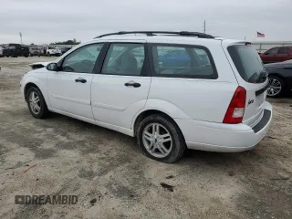 2000 Ford Focus SE with VIN 1FAFP3634YW278181, listed as a Copart auction lot 89372555 with 160,885 mi miles and Salvage Title. Bid and sale history available at DreamBid. Image 2.