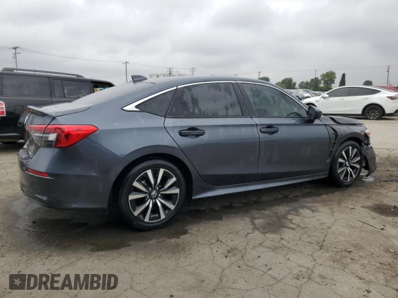 2023 Honda Civic EX z VIN 2HGFE1F72PH312995, wystawiony jako Copart lot #57284305 z przebiegiem 7 921 mil mil oraz Szkoda całkowita • Salvage title. Historia ofert i sprzedaży dostępna na DreamBid. Obrazek 3.
