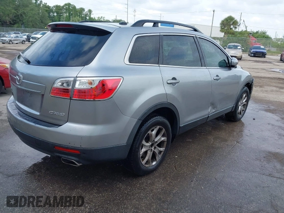 2012 Mazda CX-9 Touring with VIN JM3TB2CA3C0334249, listed as a IAAI auction lot 42092647 with 240,890 mi miles and . Bid and sale history available at carsss.com. Image 4.