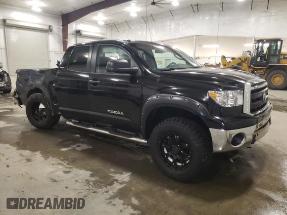 2010 Toyota Tundra 4WD Truck with VIN 5TFUM5F11AX006501, listed as a Copart auction lot 42424145 with 239,553 mi miles and Salvage Title. Bid and sale history available at carsss.com. Image 4.