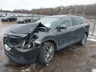 2015 Mazda CX-9 Grand Touring with VIN JM3TB2DAXF0447537, listed as a IAAI auction lot 41191694 with 157,113 mi miles. Bid and sale history available at carsss.com. Image 17.
