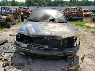 2006 Hyundai Azera SE z VIN KMHFC46F56A035393, wystawiony jako Copart lot #63339195 z przebiegiem Nie podano mil oraz Szkoda całkowita • Salvage title. Historia ofert i sprzedaży dostępna na DreamBid. Obrazek 5.