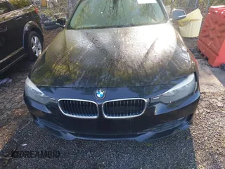 2015 BMW 3 Series 328i with VIN WBA3A5C59FF609332, listed as a IAAI auction lot 41994091 with 194,245 mi miles. Bid and sale history available at carsss.com. Image 6.