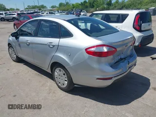 2014 Ford Fiesta S with VIN 3FADP4AJ9EM182707, listed as a IAAI auction lot 42264724 with 149,051 mi miles and . Bid and sale history available at DreamBid. Image 3.