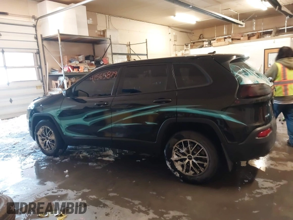 2015 Jeep Cherokee Sport with VIN 1C4PJMAB6FW773953, listed as a IAAI auction lot 41565879 with 242,580 mi miles. Bid and sale history available at carsss.com. Image 14.