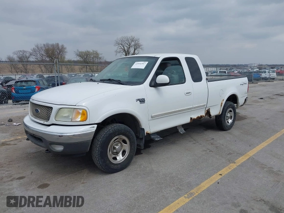 2003 Ford F-150 XL with VIN 1FTRX18L73NB72735, listed as a IAAI auction lot 42016567 with 0 mi miles. Bid and sale history available at carsss.com. Image 2.