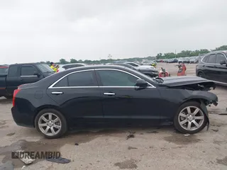 2014 Cadillac ATS Standard RWD with VIN 1G6AA5RA1E0108650, listed as a IAAI auction lot 42268622 with 99,703 mi miles and . Bid and sale history available at DreamBid. Image 13.