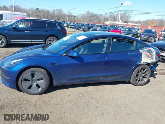 2023 Tesla Model 3 with VIN 5YJ3E1EA2PF690335, listed as a IAAI auction lot 41732701 with 22,238 mi miles and . Bid and sale history available at DreamBid. Image 14.