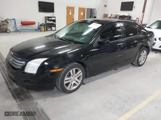 2007 Ford Fusion SE with VIN 3FAHP07Z97R275689, listed as a IAAI auction lot 42040917 with 183,886 mi miles. Bid and sale history available at carsss.com. Image 2.