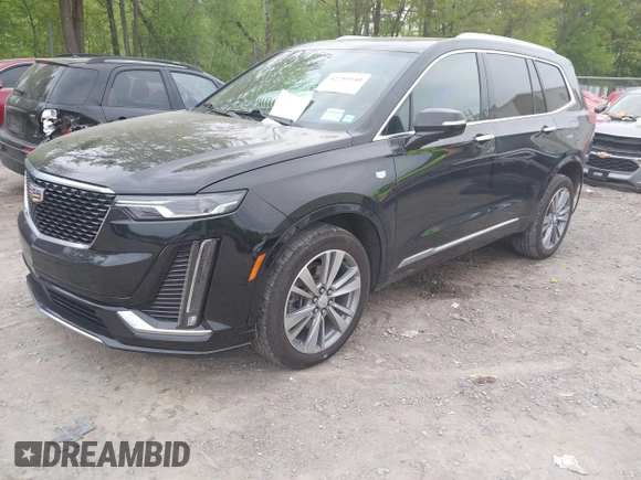 2022 Cadillac XT6 Premium Luxury with VIN 1GYKPDRS5NZ149971, listed as a IAAI auction lot 42259140 with 51,704 mi miles and . Bid and sale history available at DreamBid. Image 18.