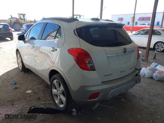 2015 Buick Encore with VIN KL4CJASB0FB211656, listed as a IAAI auction lot 41631355 with 135,232 mi miles. Bid and sale history available at carsss.com. Image 3.