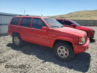 1997 Jeep Grand Cherokee Limited with VIN 1J4GZ78Y7VC573971, listed as a Copart auction lot 61358024 with 171,055 mi miles and Salvage Title. Bid and sale history available at carsss.com. Image 4.