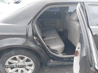 2006 Chrysler 300 Touring z VIN 2C3LA53G36H113174, wystawiony jako IAAI lot #42274652 z przebiegiem 229 422 mil mil oraz . Historia ofert i sprzedaży dostępna na DreamBid. Obrazek 8.
