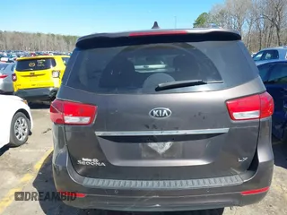 2017 Kia Sedona LX with VIN KNDMB5C14H6329340, listed as a IAAI auction lot 41803814 with 106,672 mi miles. Bid and sale history available at carsss.com. Image 16.