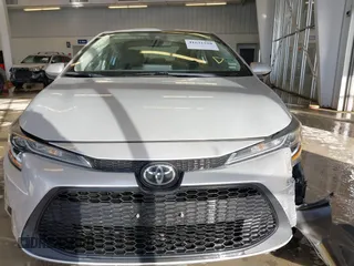 2021 Toyota Corolla LE with VIN 5YFEPMAE0MP214064, listed as a IAAI auction lot 41631520 with 77,396 mi miles and . Bid and sale history available at DreamBid. Image 12.