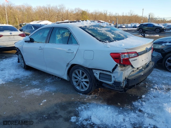 2014 Toyota Camry Hybrid LE with VIN 4T1BD1FK7EU114181, listed as a IAAI auction lot 41294936 with 115,986 mi miles. Bid and sale history available at carsss.com. Image 3.