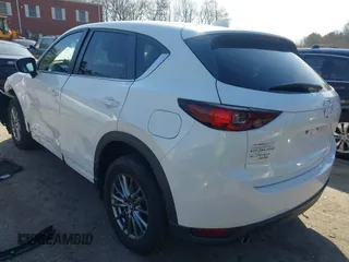 2017 Mazda CX-5 Touring z VIN JM3KFBCL8H0214052, wystawiony jako IAAI lot #41940783 z przebiegiem 120 083 mil mil oraz . Historia ofert i sprzedaży dostępna na DreamBid. Obrazek 3.
